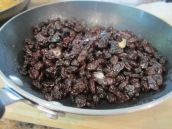 Heat 1 tablespoon butter and raisins in a small frying pan over medium heat for about 1 minute or until the butter melts. Remove from heat and set aside.